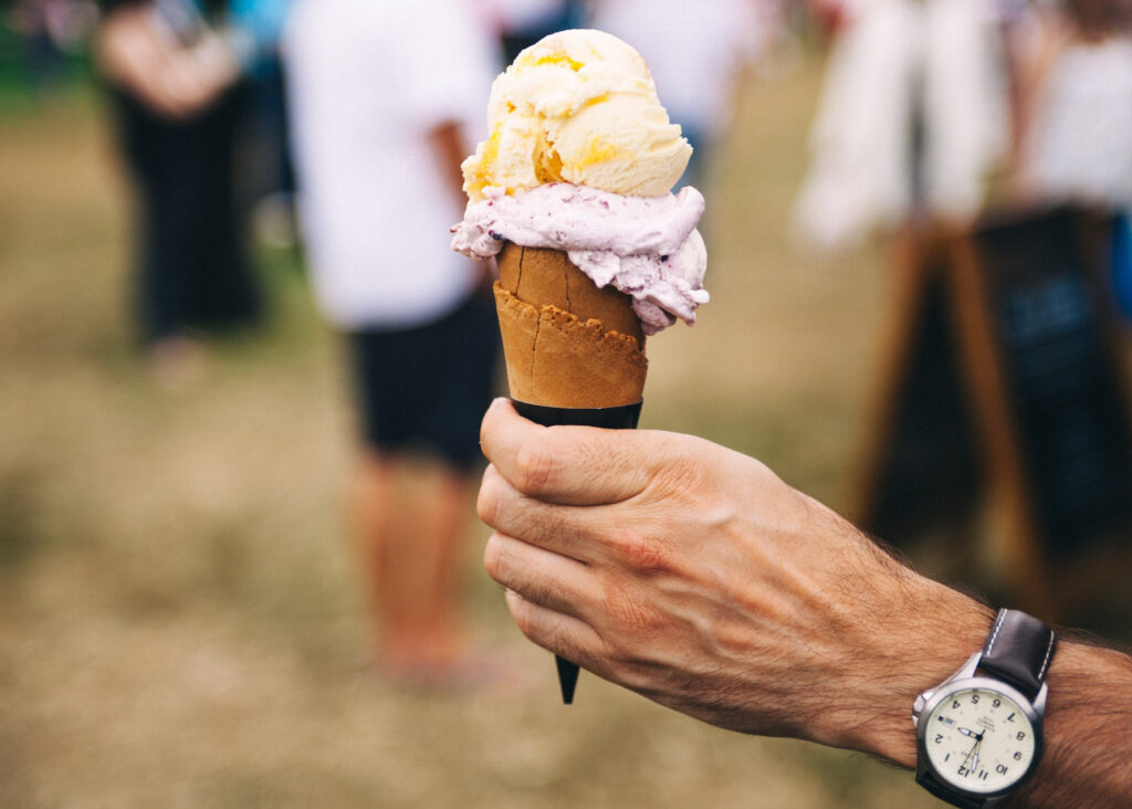 Hand holding ice cream cone